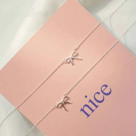 LIVVY Silver Bowknot Pendant Necklace for Elegant Style